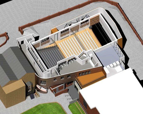 Design visualisation of Putney High School's Performing Arts Centre, an aerial cutaway showing the auditorium within the surrounding school buildings