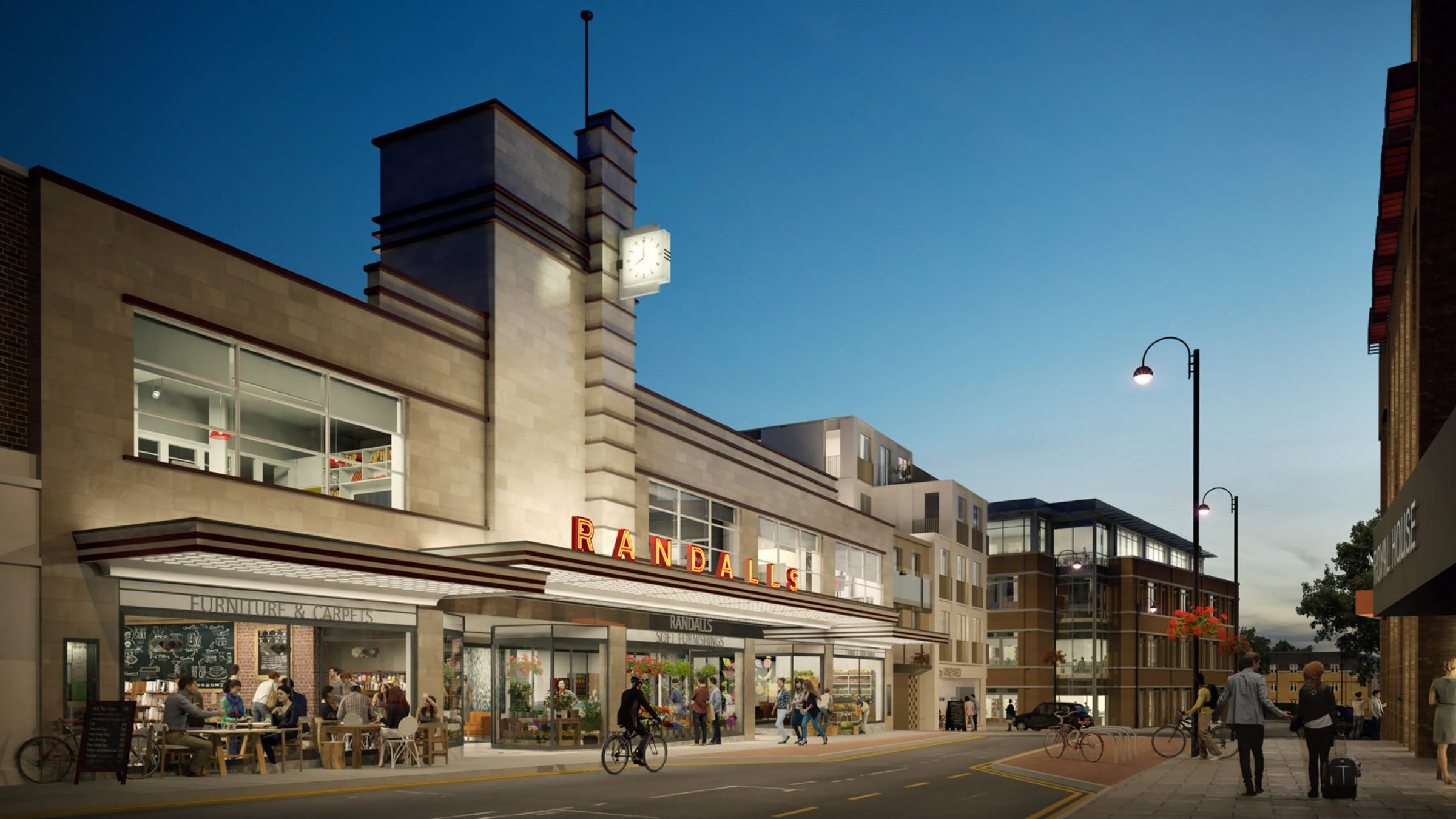 Design visualisation of the retained 1930s Randall's department store frontage at dusk, its Art Deco clock tower and neon signage lit