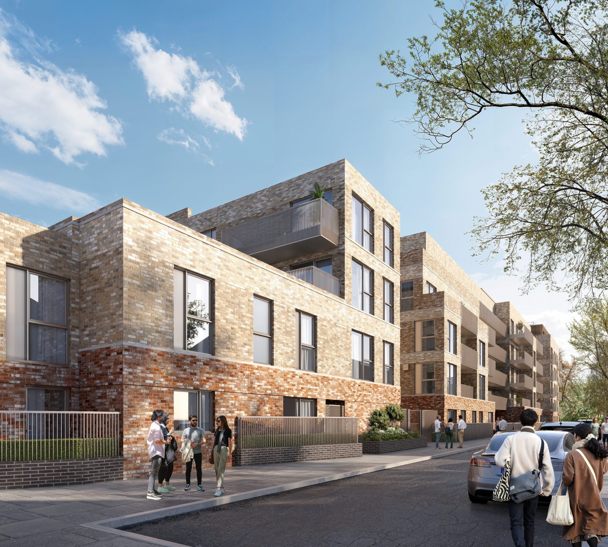 Rye Hill Park's second linked block on its street corner, brick facade with balconies above a red-brick ground floor