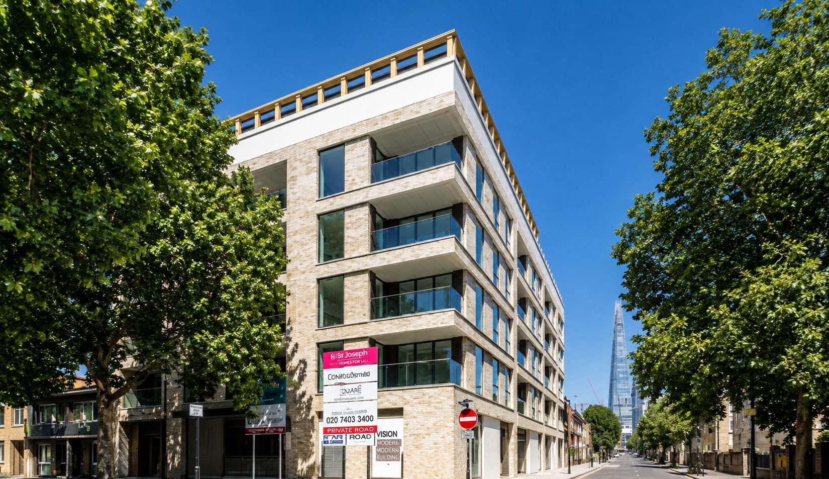 Trilogy's corner block in daylight, seen from the street with mature trees framing the view and the Shard beyond